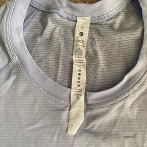 Lululemon Baby Blue Swiftly Tech short sleeve shirt hip length size 6